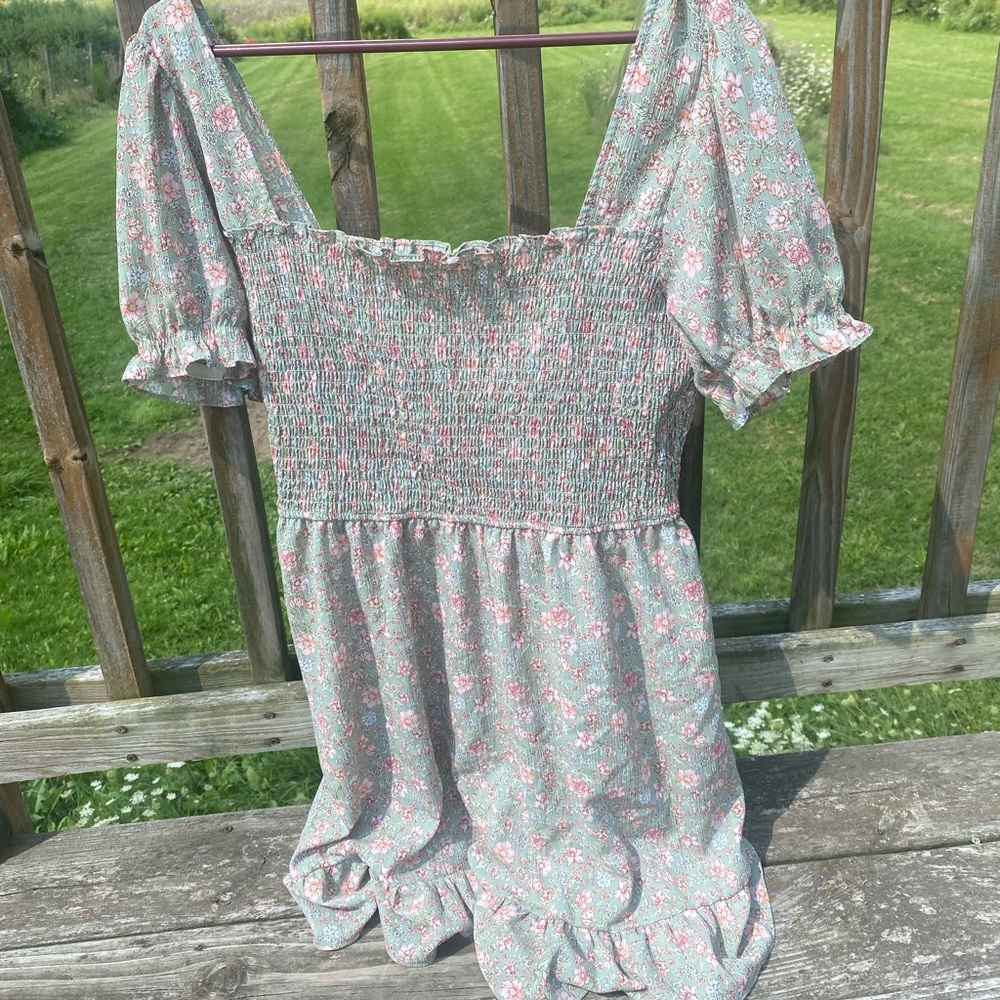 Women’s green dress with pink flowers